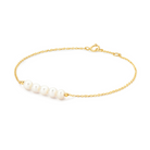 Gold bracelet with pearls on a white background