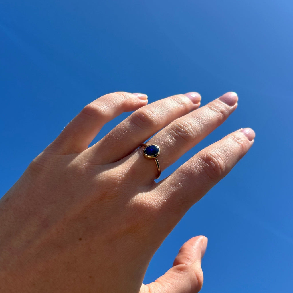 opal ring on model hand