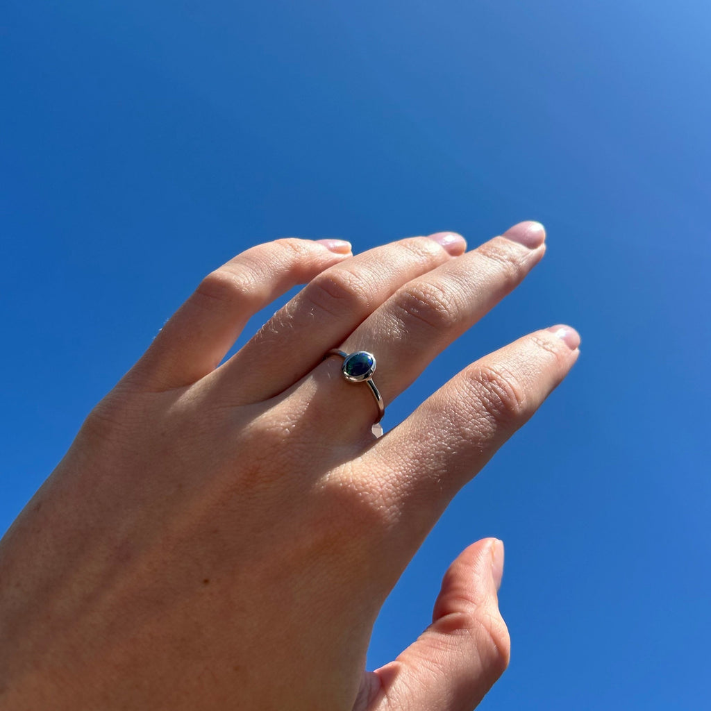 opal ring on model hand