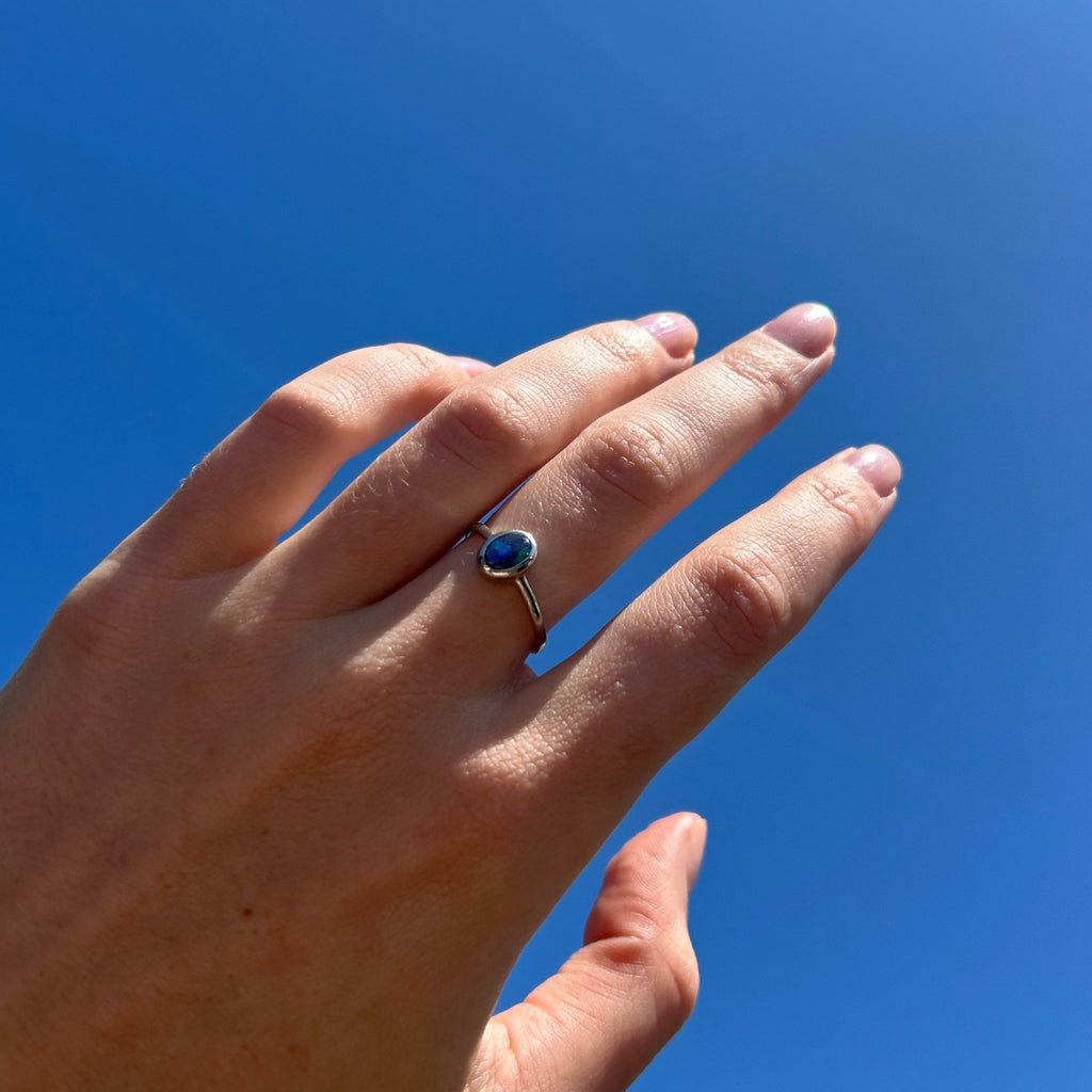 opal ring on model hand