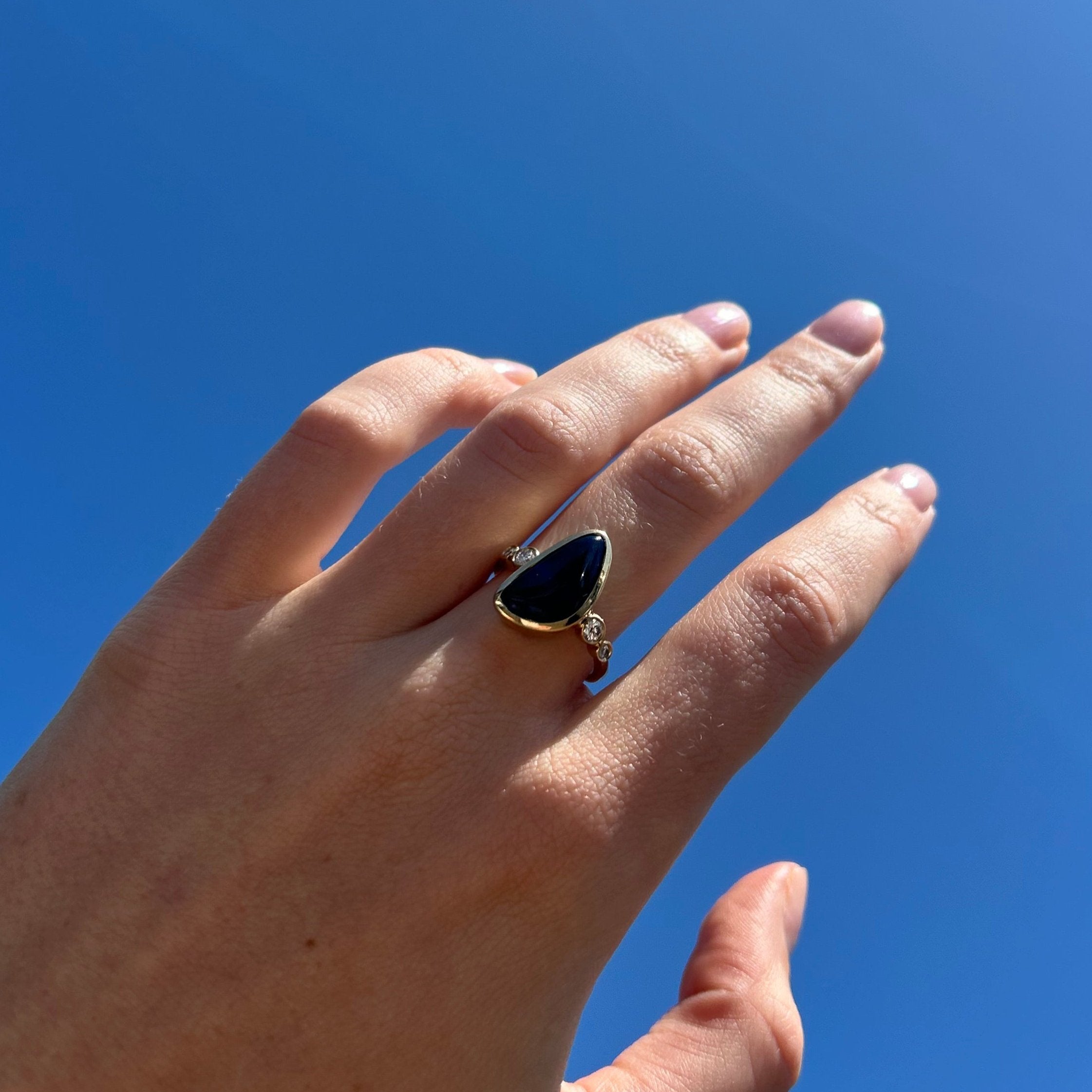 opal ring on model hand