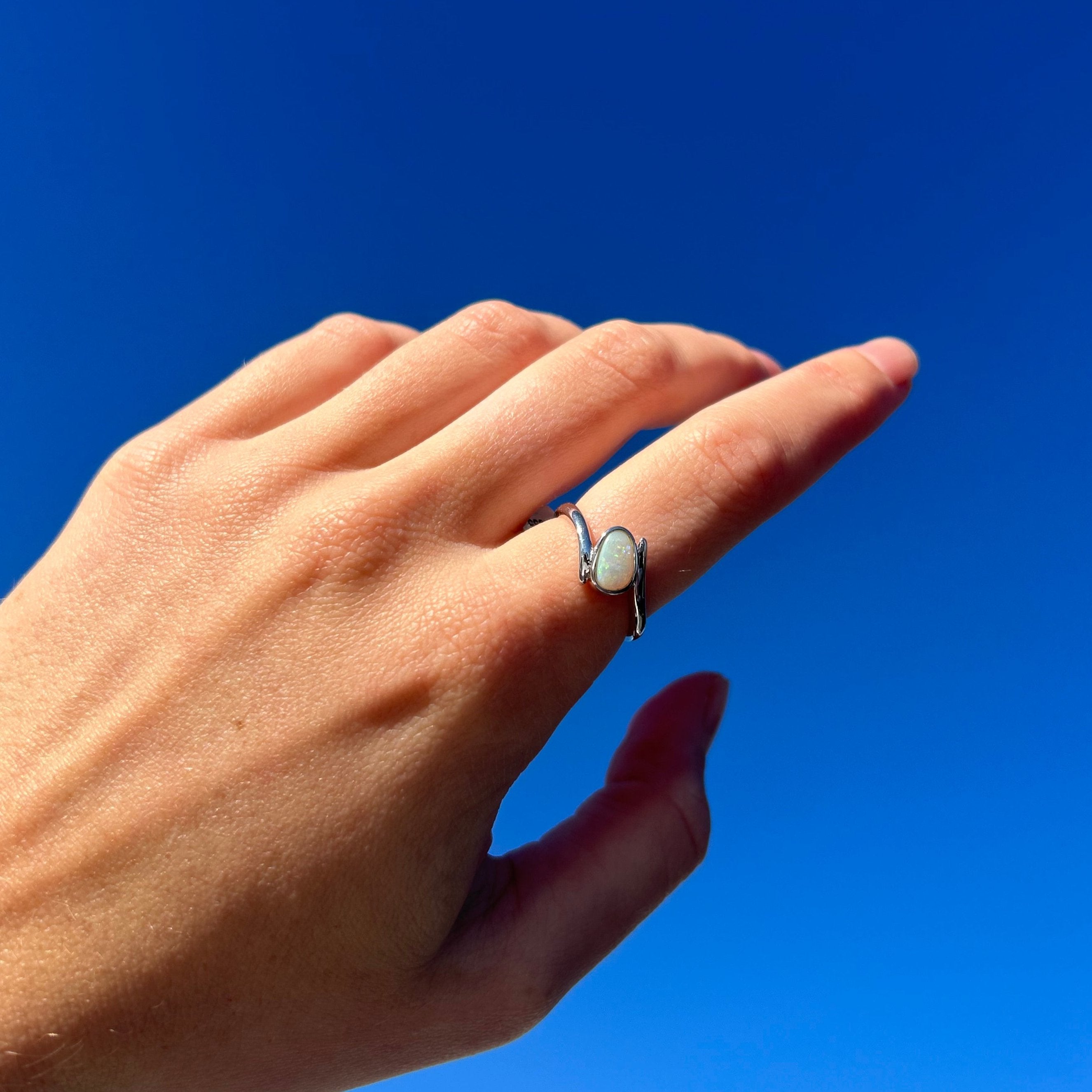 opal ring on model hand